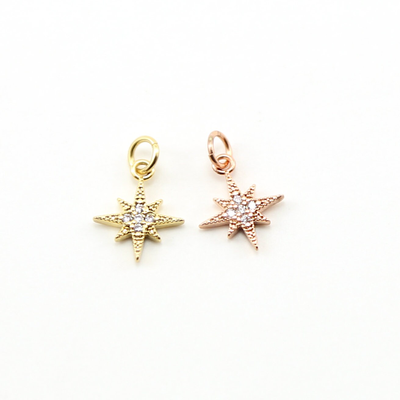 Rhodium Plated Small Pointed Pave Star Starburst CZ Celestial Charm