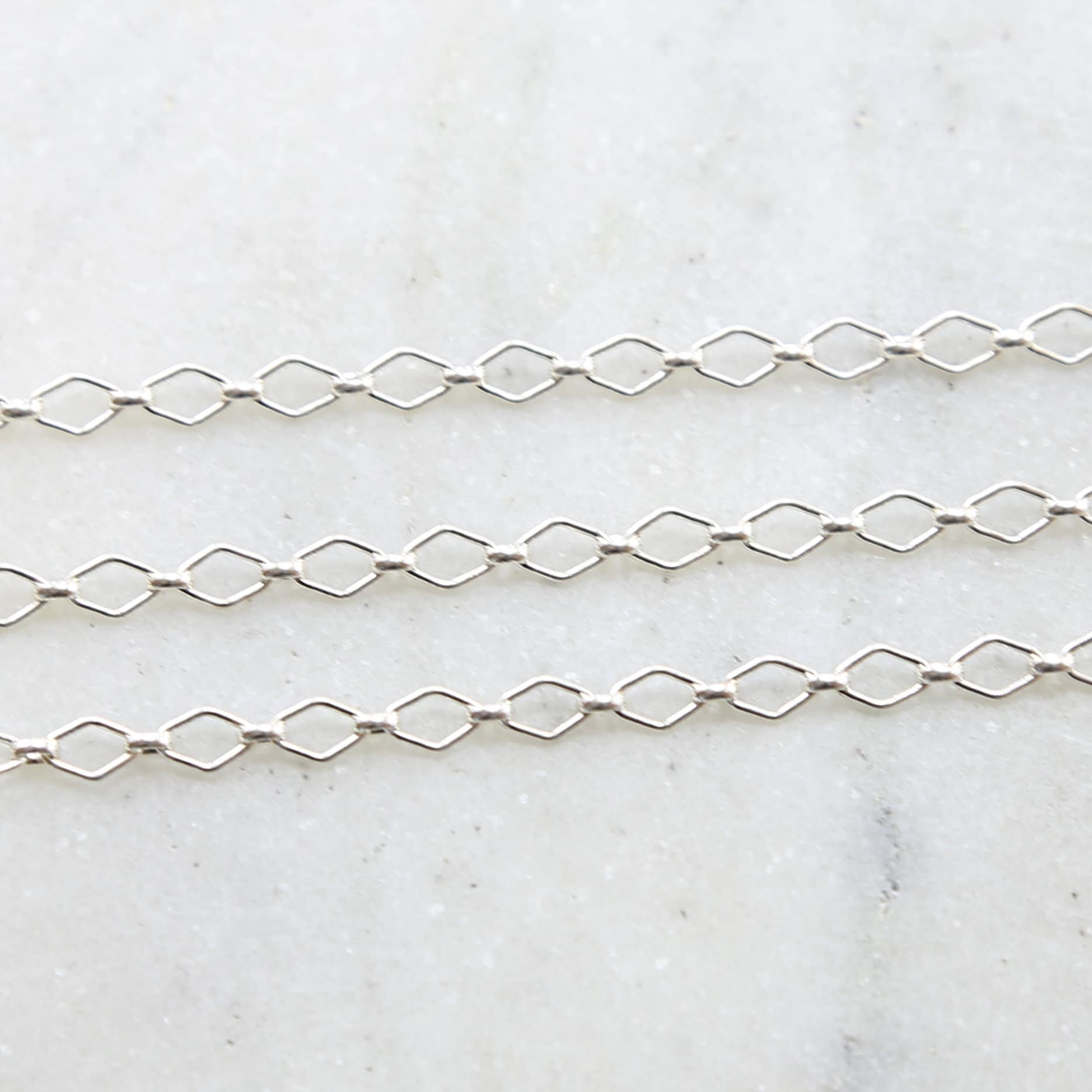 Sterling Silver Sturdy Diamond Link Chain 5.5mm x 4mm – Sold by the Foot