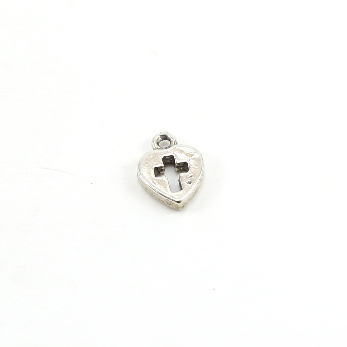Sterling Silver Tiny Heart with Cross Cut Out Charm in Dainty Heart