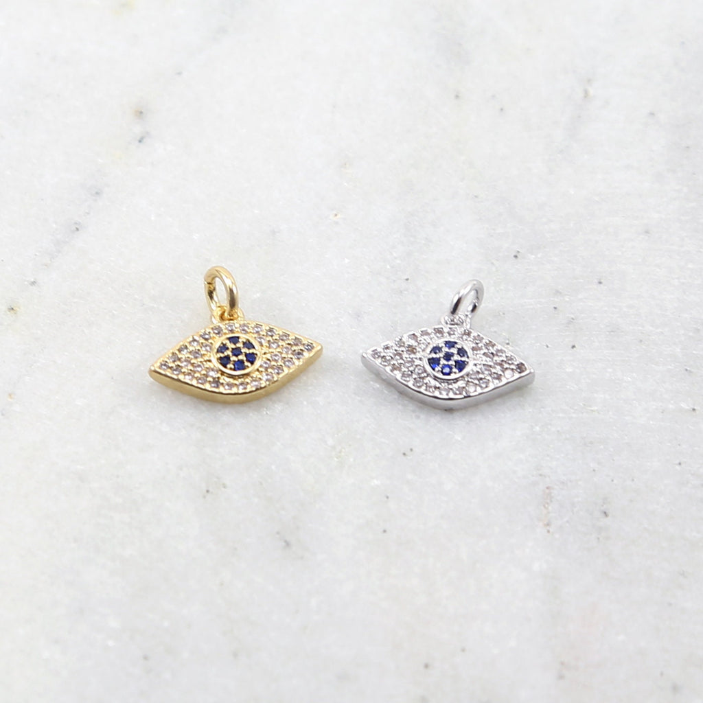 Rhodium Plated Pave CZ with Blue Stone Center Evil Eye Protector
