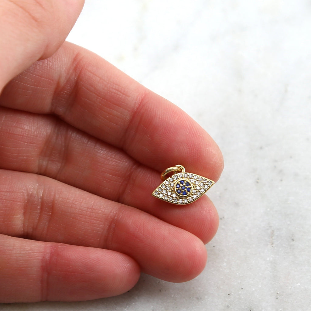 Rhodium Plated Pave CZ with Blue Stone Center Evil Eye Protector