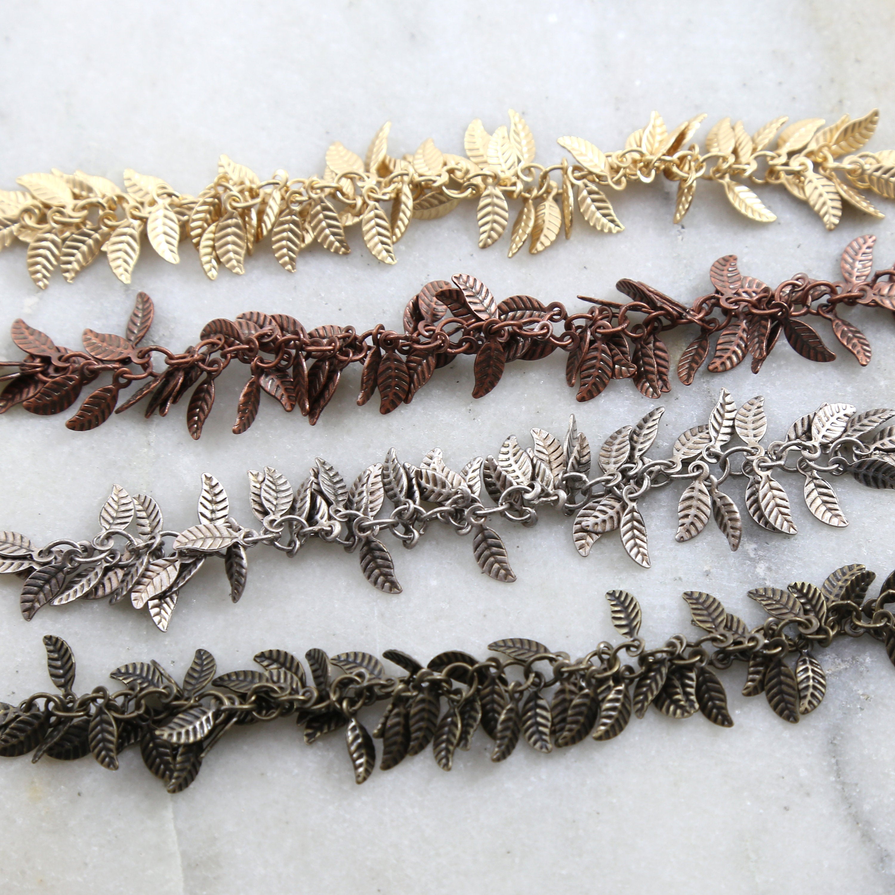 Brass Tiny Dangle Leaf Chain in Antique Silver Antique – Sold by the Foot