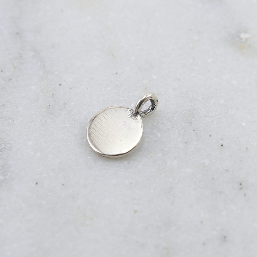 Sterling Silver Stamped Lotus on Teeny Tiny Round Circle Disk Charm