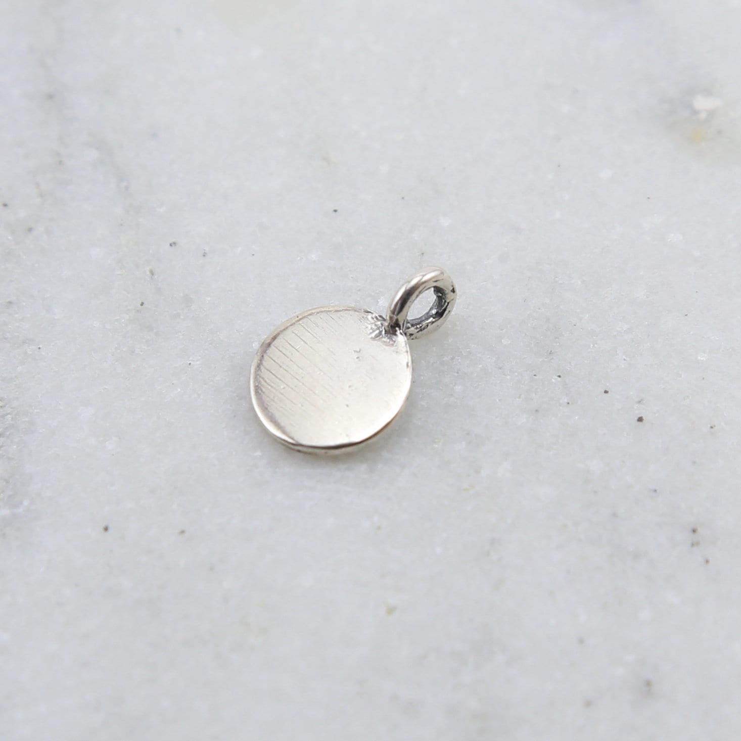 Sterling Silver Stamped Lotus on Teeny Tiny Round Circle Disk Charm