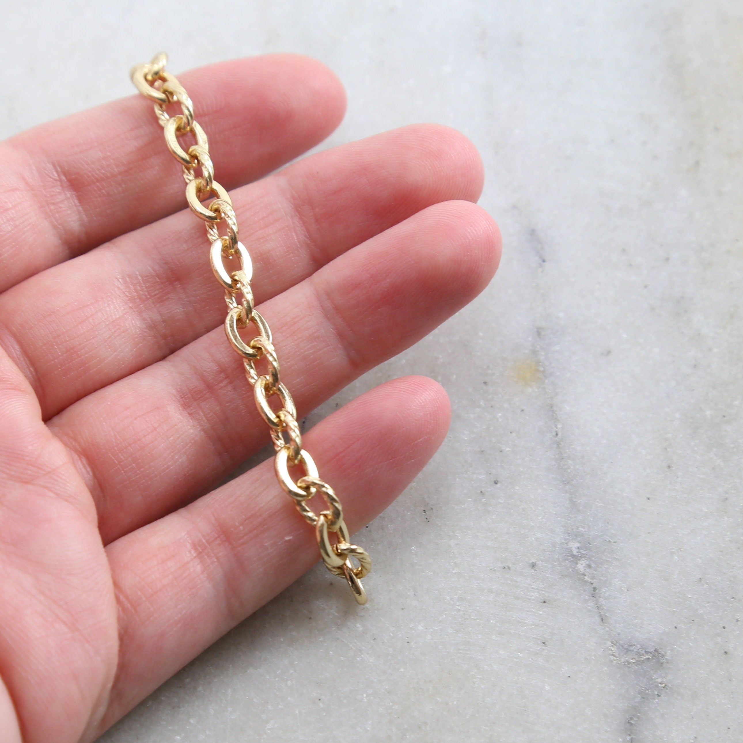 Brass Sturdy 7mm x 5mm Openable Textured Oval Extender – Sold by the Foot