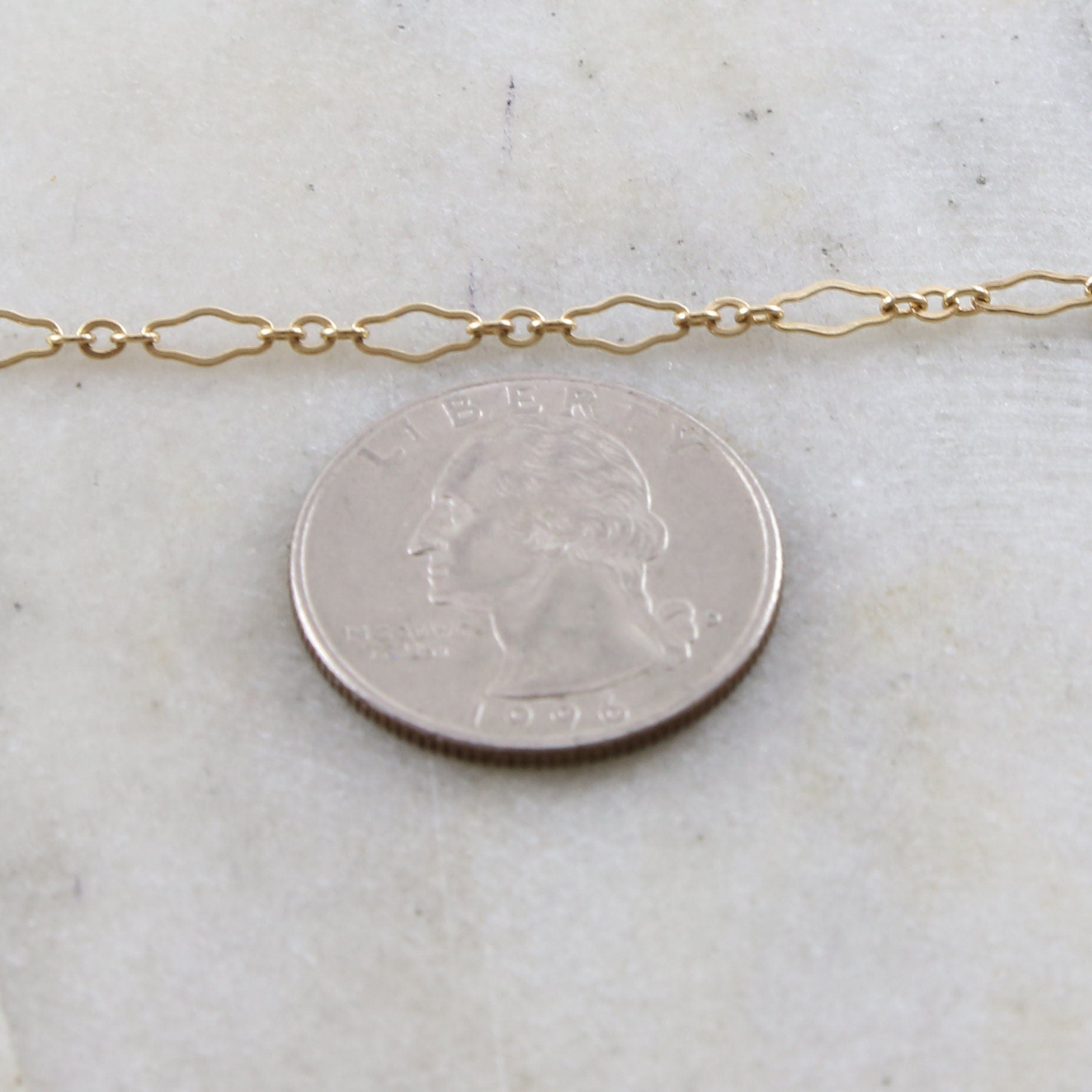 14K Gold Filled 6.7mm x 3mm Delicate Flat Kringle Fancy – Sold by the Foot