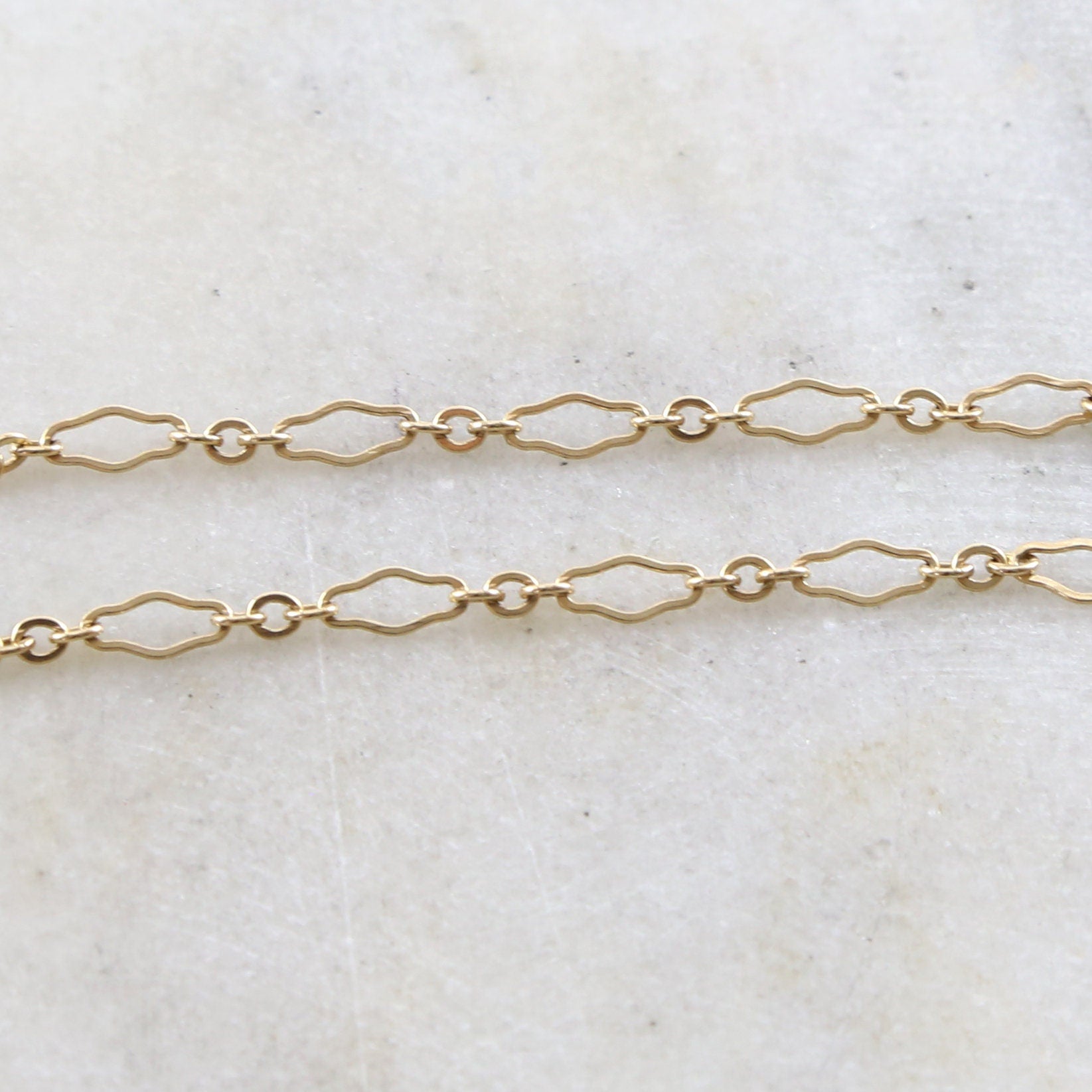 14K Gold Filled 6.7mm x 3mm Delicate Flat Kringle Fancy – Sold by the Foot