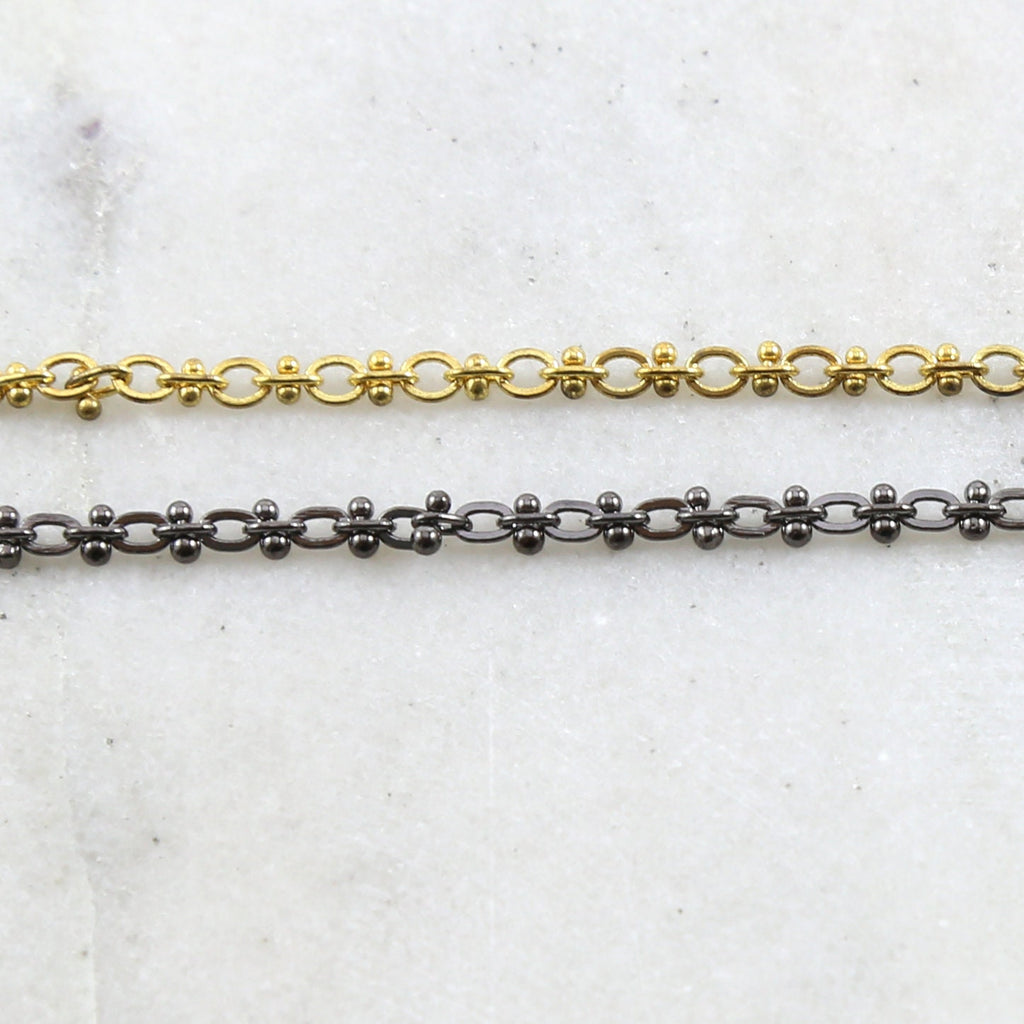 2.5mmx3mm Brass Chain Small Oval with Decorate Barbells – Sold by the Foot
