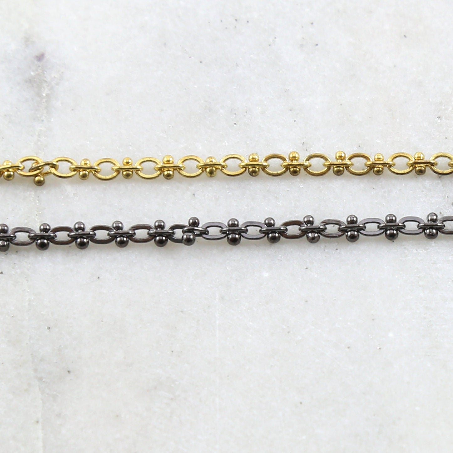2.5mmx3mm Brass Chain Small Oval with Decorate Barbells – Sold by the Foot