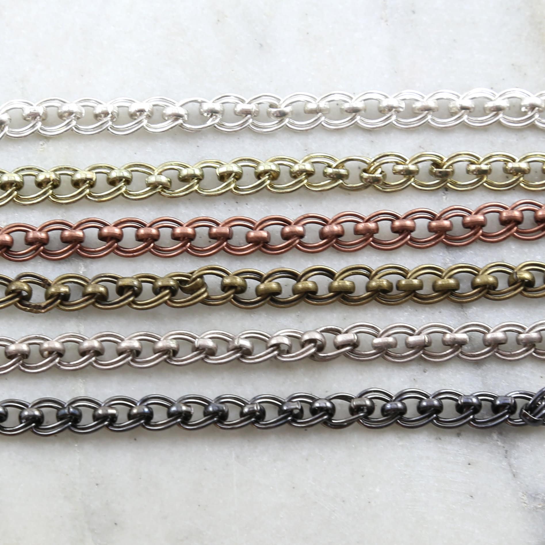 7.5mmx6.8mm Brass Rolo Slanted Oval Chain in 6 Finishes – Sold by the Foot