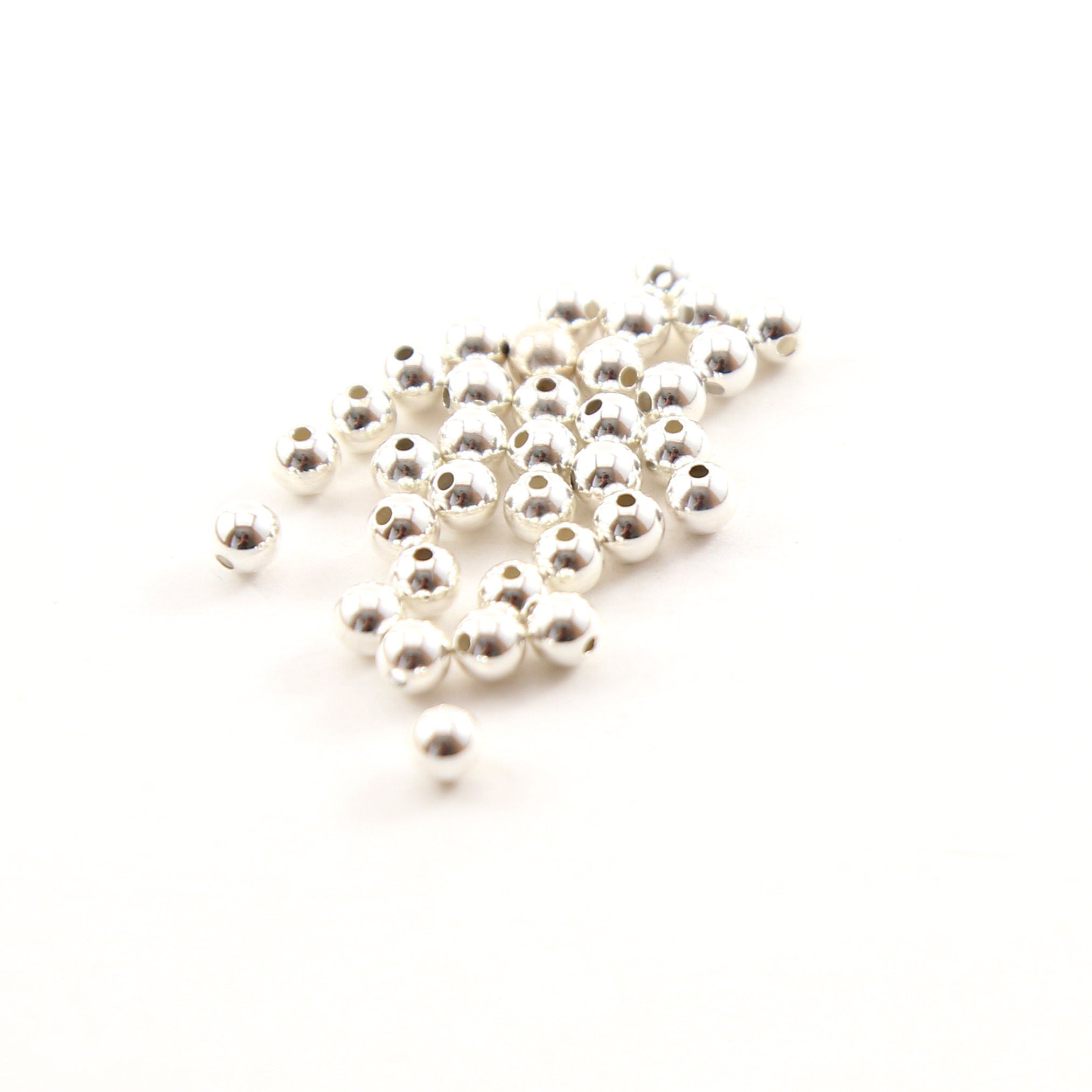 Sterling Silver 4mm Smooth Seamless Round Spacer Beads (25pc)