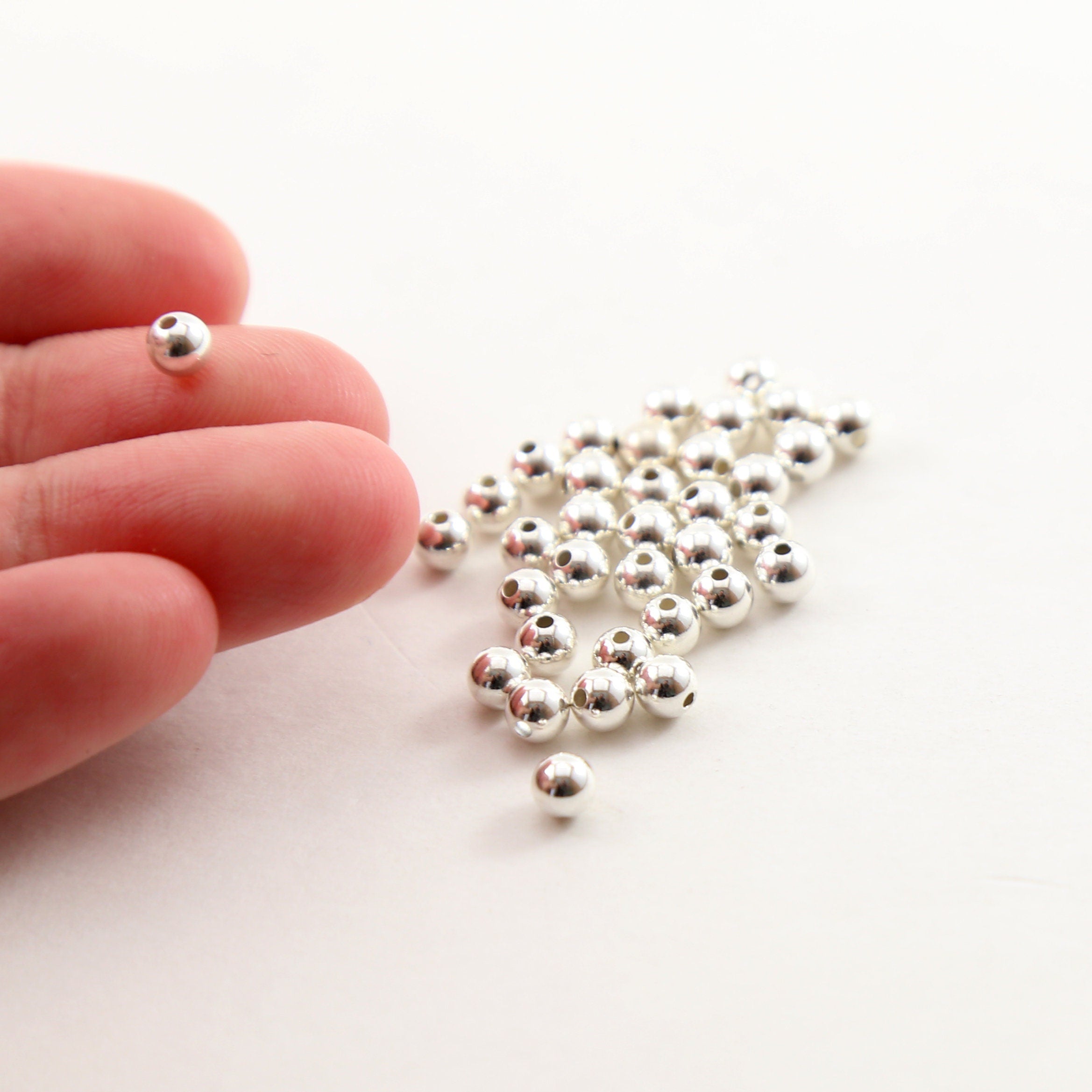 Sterling Silver 4mm Smooth Seamless Round Spacer Beads (25pc)