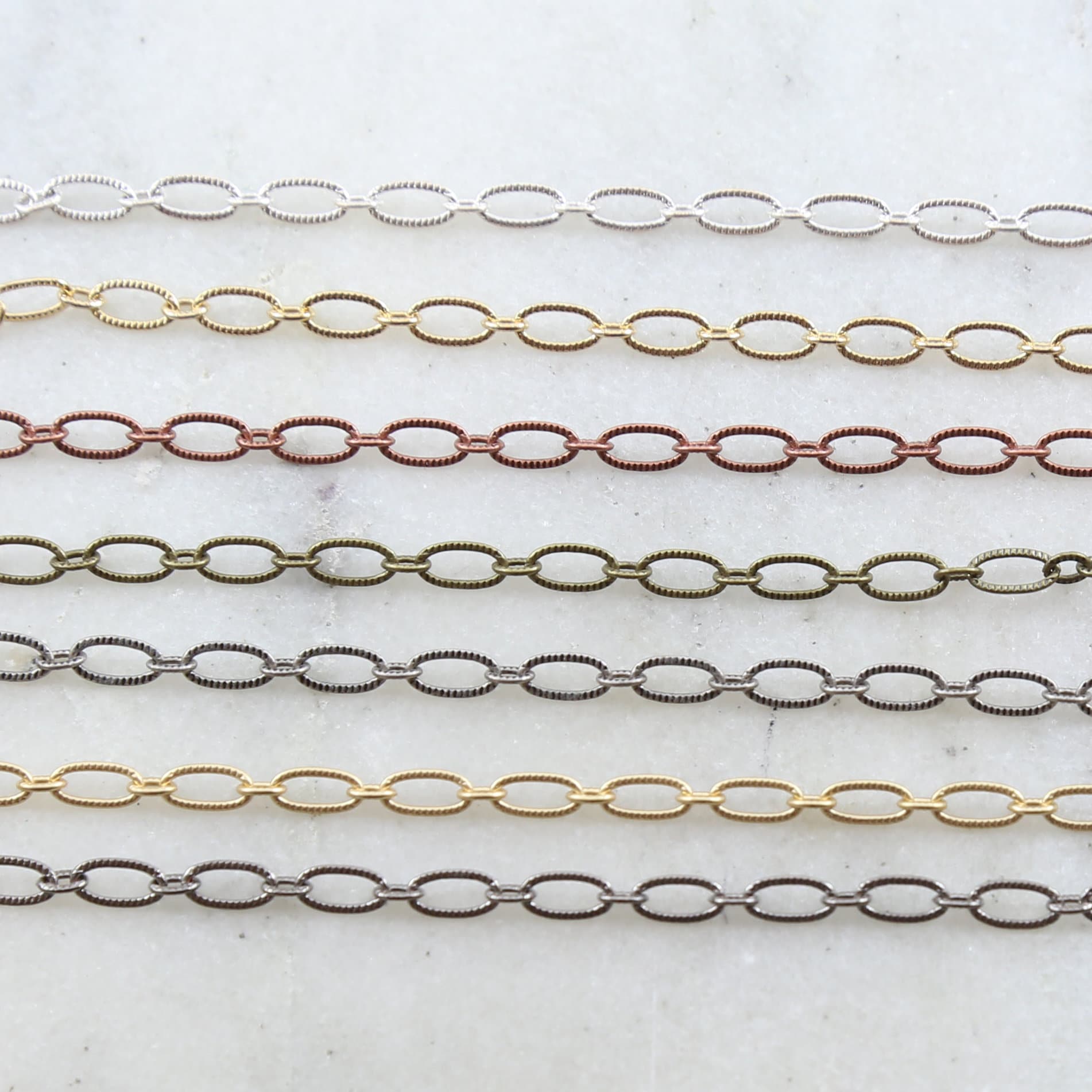 3.5mmx6.5mm Brass Small Oval Textured Crimped Chain in 7 – Sold by the Foot
