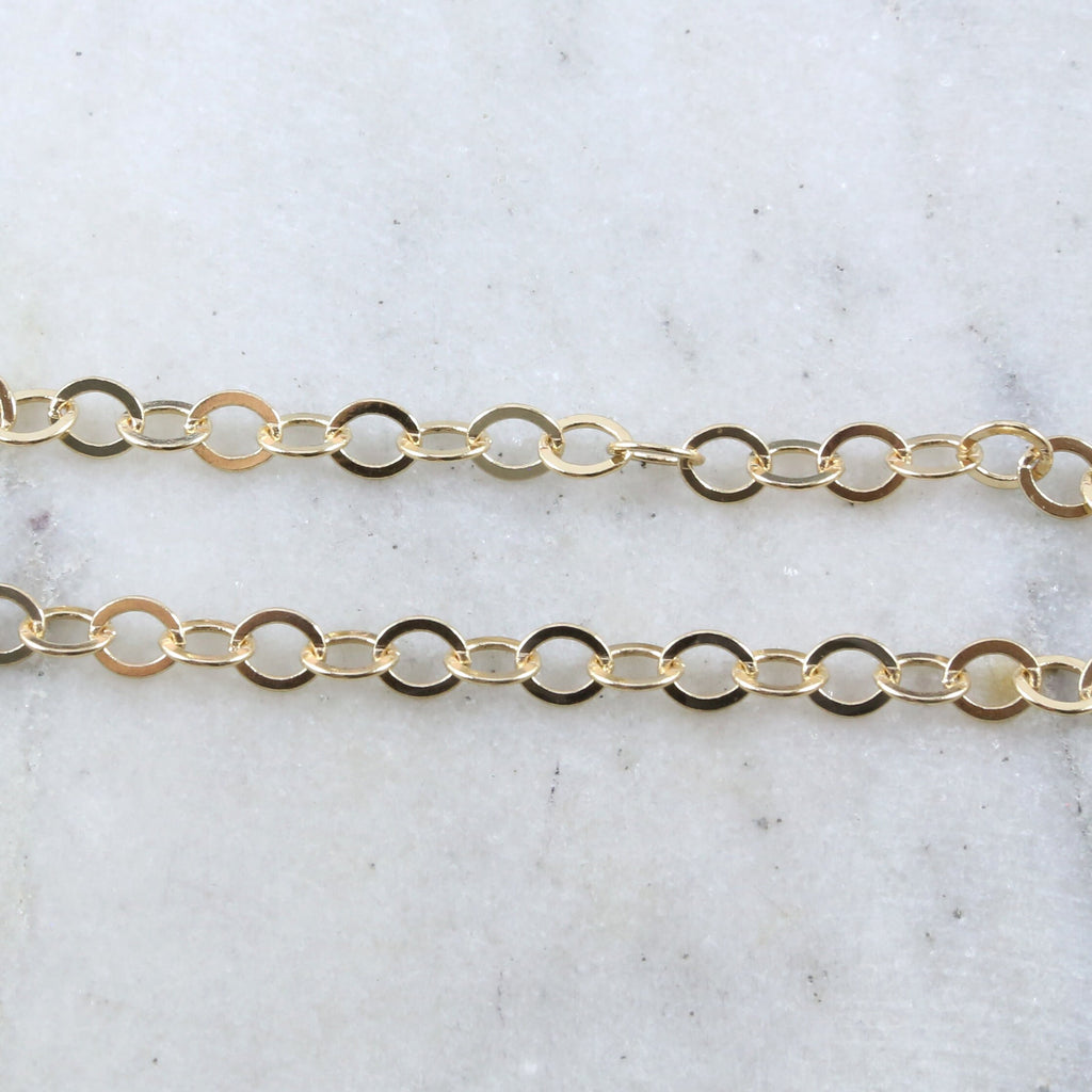 Brass Shiny Gold Oval 6mm x 5mm Dainty Flat Link Oval – Sold by the Foot
