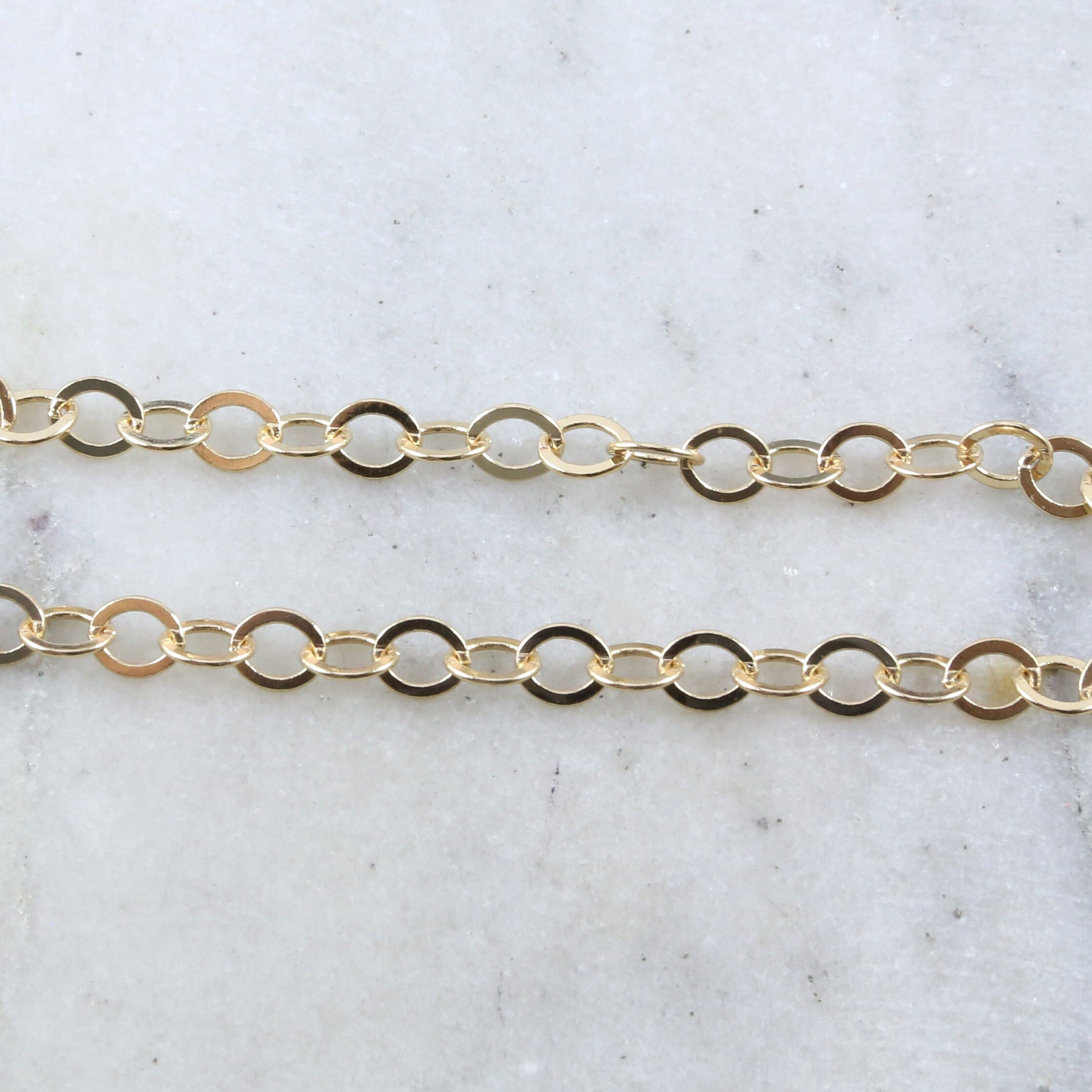 Brass Shiny Gold Oval 6mm x 5mm Dainty Flat Link Oval – Sold by the Foot