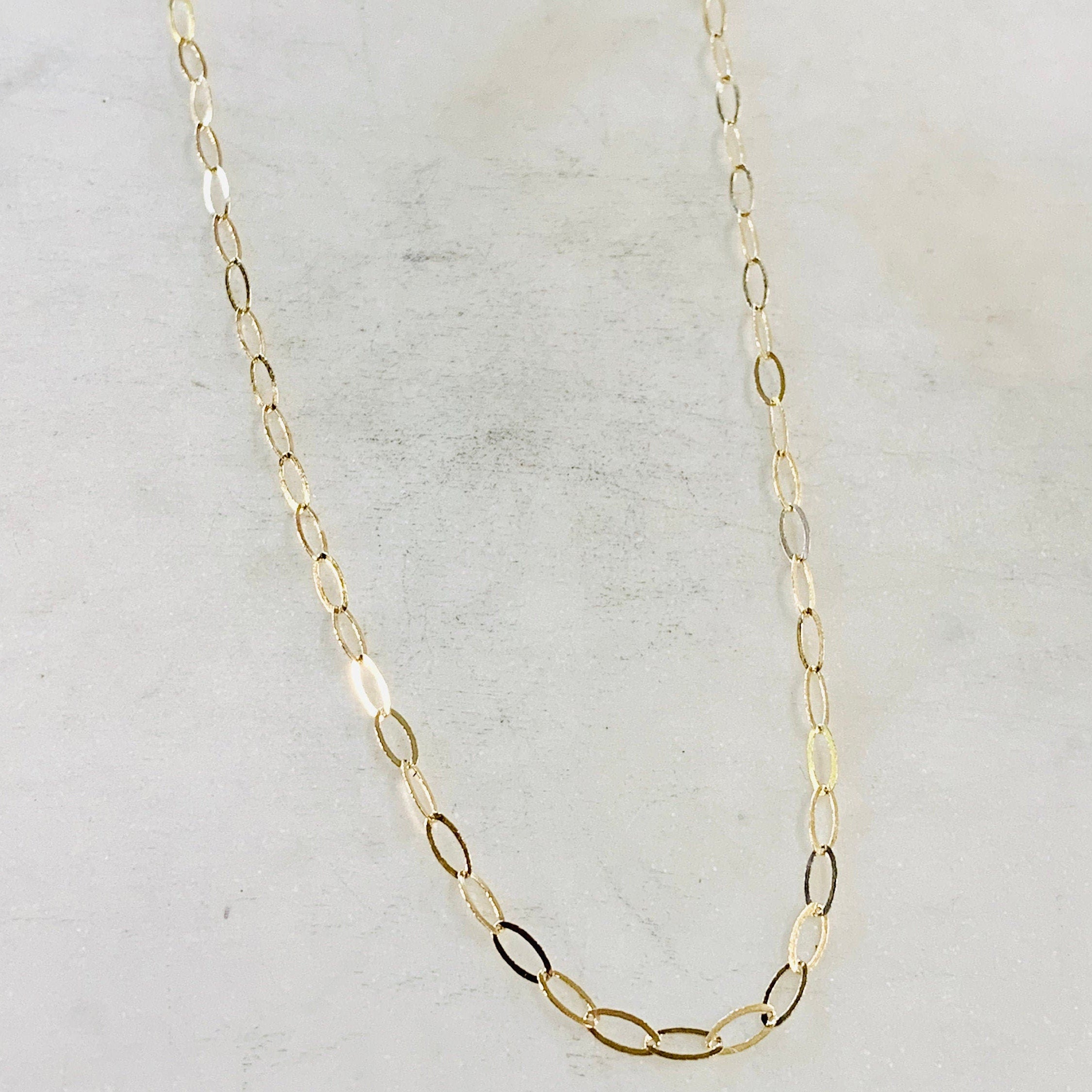 14K Gold Filled 5.7mm x 2.8mm Chain Flat Hammered Oval – Sold by the Foot