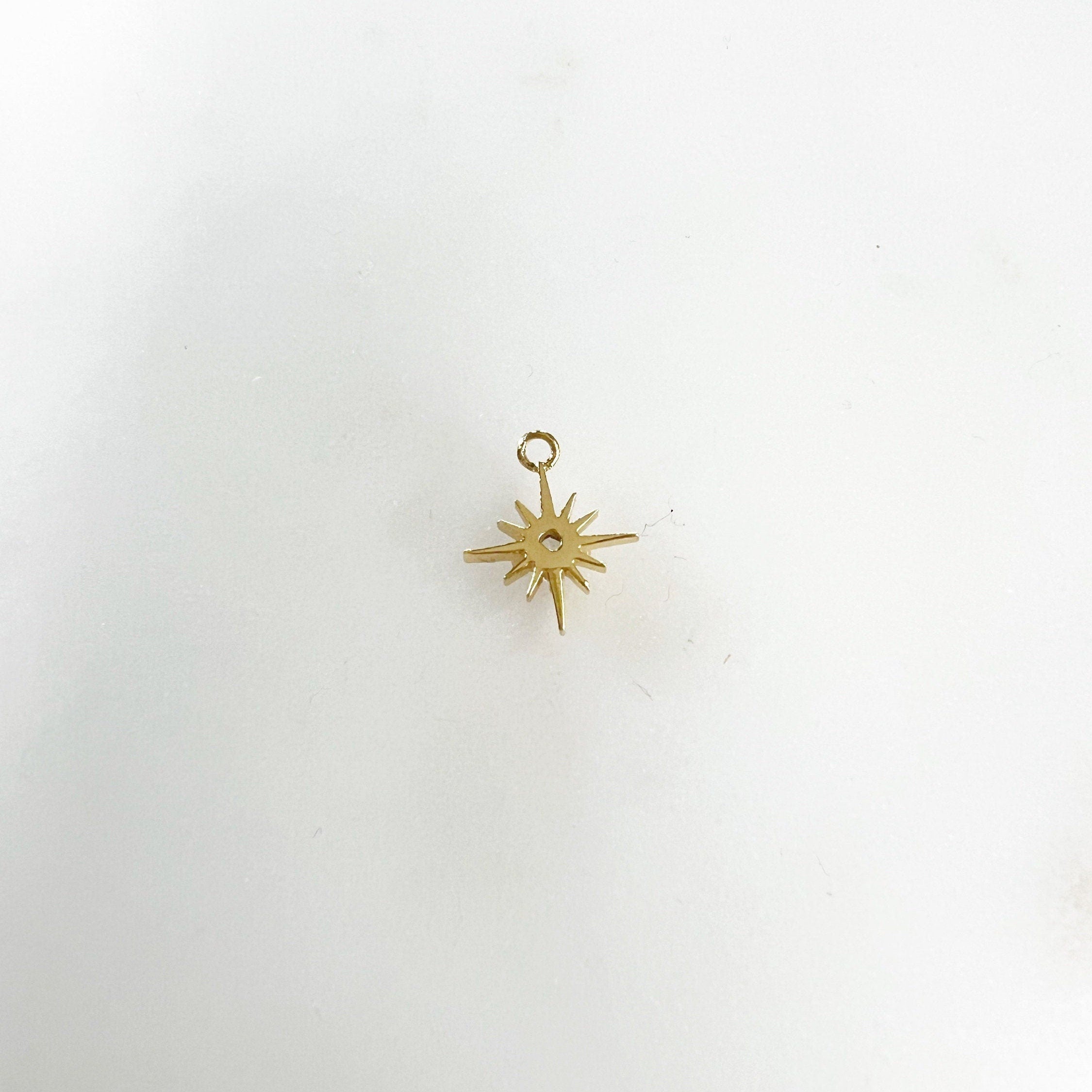 Gold Plated 12 Point Star with Turquoise Color CZ North Star Charm
