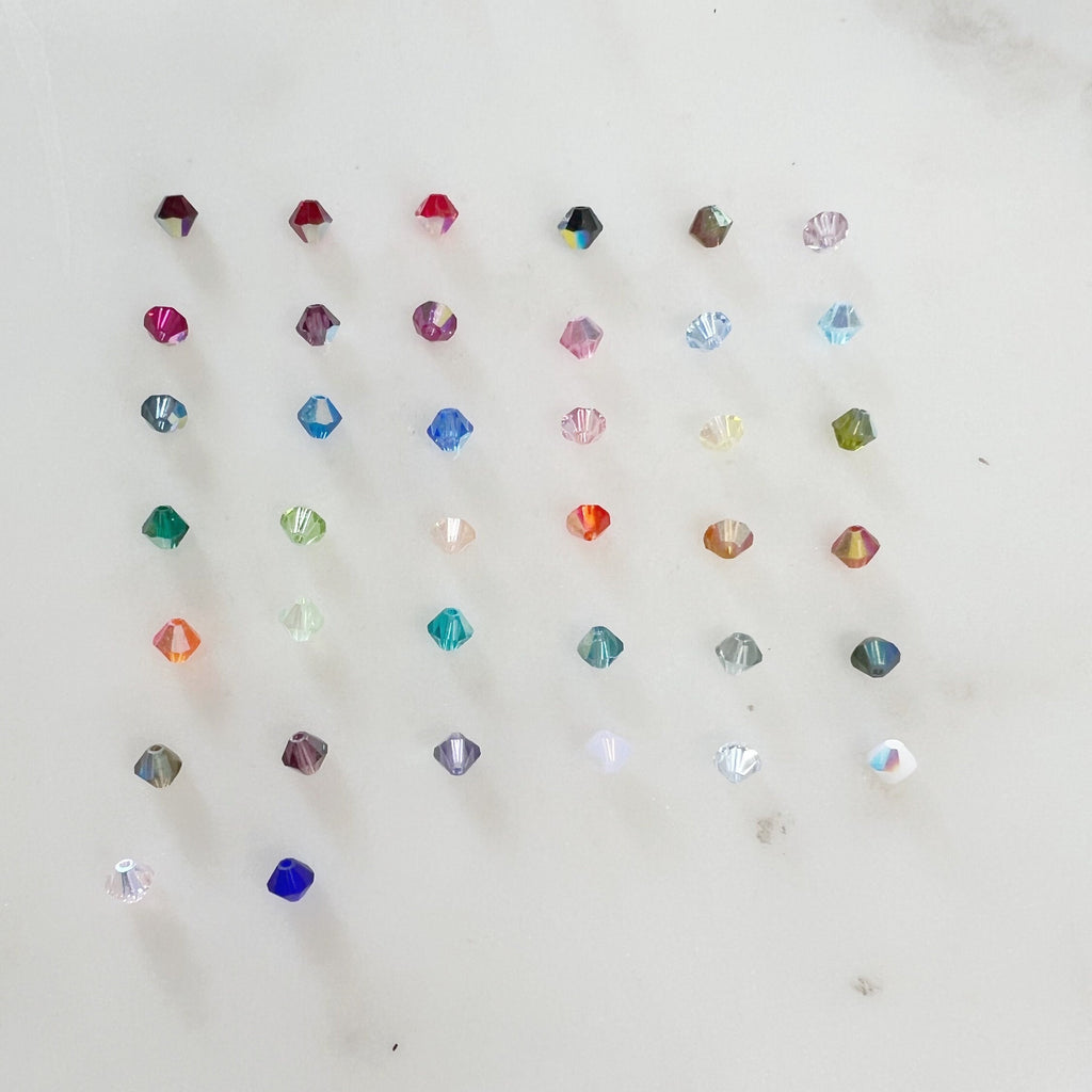 4mm Swarovski CrystalAB Aurora Borealis Bicone Beads (144pc)