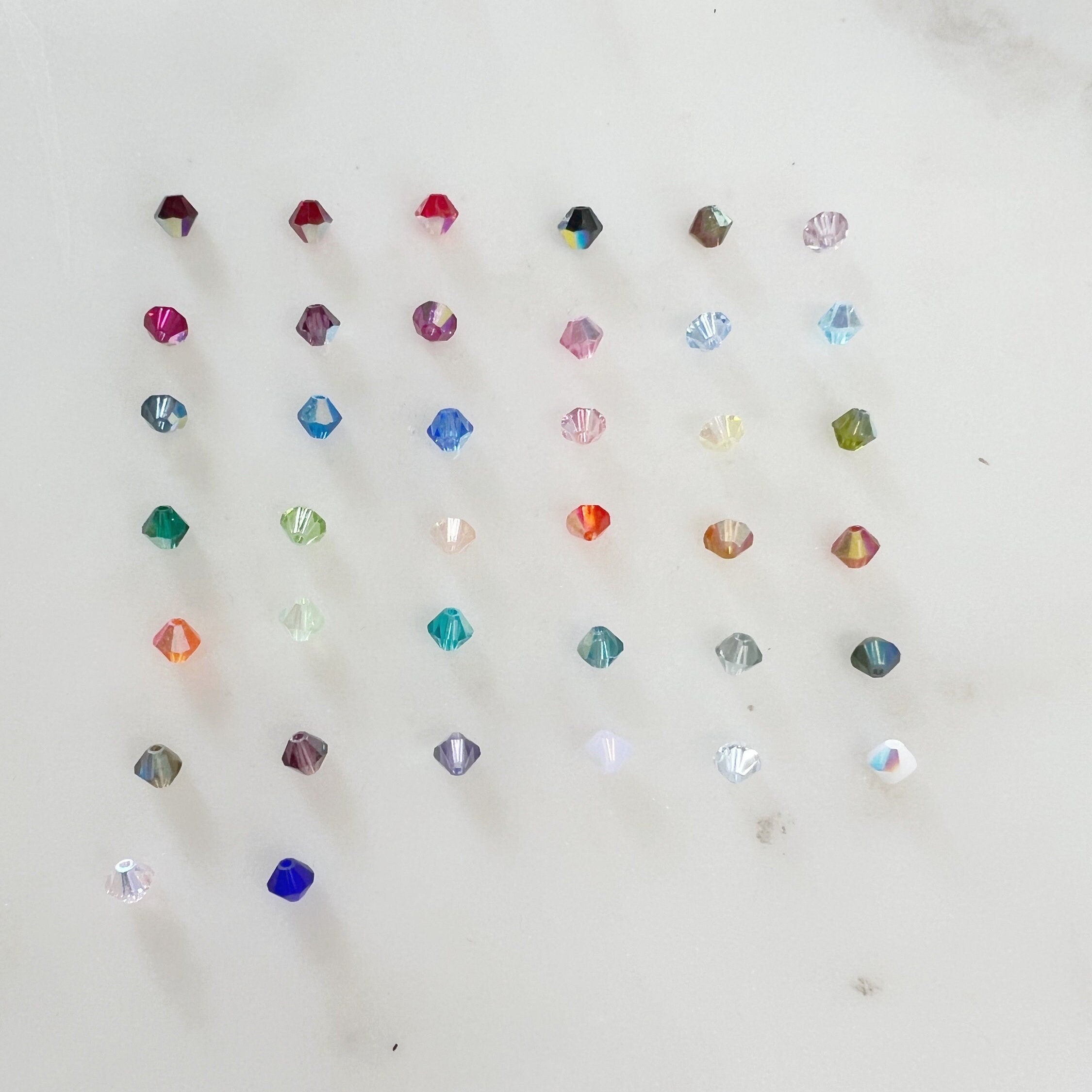 4mm Swarovski CrystalAB Aurora Borealis Bicone Beads (144pc)